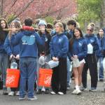 Sequim Gazette photo by Matthew Nash/ Sequim High School Interact Club members get ready to begin their journey from Sequim Middle School to the Dungeness River to carry cartons and buckets filled with water for the clubs annual Walk for Water fundraiser.
