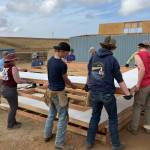 Photo courtesy Keith Sandell/
Sequim Community Church team members lift together a portion of a new home they constructed in Mexico during spring break.