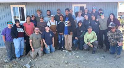 Photos courtesy Keith Sandell
Sequim Community Churchs mission trip team members with new homeowners stand outside one of two homes they built in Mexico during spring break for local families. Its the second time theyve built homes in Vicente Guerrero in Baja California, Mexico.