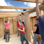 Team members work together to place the roof base for one of two homes in Vicente Guerrero in Baja California, Mexico. Sequim Community Church sent a team to build the homes March 29-April 5 through Youth With A Mission (YWAM).