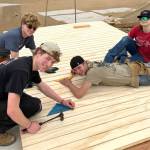 Team members Jacob and Noah Oberly, Alex Creery and Reagan Whitmarsh work on a portion of a home in Mexico during Sequim Community Churchs Mexico mission trip.