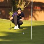Sequim Gazette photos by Matthew Nash
Kendra Dodson lines up a putt on April 23 at The Cedars at Dungeness. She shot a 42 through nine holes tying with teammate Raimey Brewer. Dodson made par on four holes.