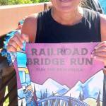 Olympic Peninsula News Group photo by Pierre LaBossiere/
Jennifer Mathews of Belfair won the womens 10K at the Sequim Railroad Bridge run.