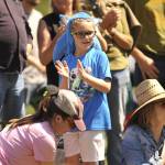 Sequim Gazette photo by Matthew Nash/ Harrison Wahlberg, 6, claps for winners of the Kids Parade on May 2. He dressed as Sonic the Hedgehog.