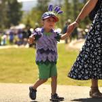 Sequim Gazette photo by Matthew Nash/ Landon Thompson, 2, participates in the Kids Parade as a lavender plant. His mom Chantell said when she heard about the All about Sequim category, she thought of lavender. He won first place for his costume.