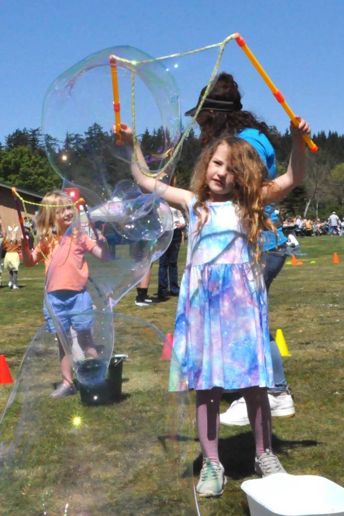 Sequim Gazette photo by Matthew Nash
Patty Hansen, 6, makes bubbles during the Family Fun Days courtesy the Olympic Peninsula YMCA.