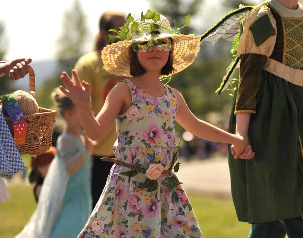 Sequim Gazette photo by Matthew Nash/ Adele Duval-Saffold, 6, walks in the Kids Parade sporting a sunhat and matching mask she made.
Sequim Gazette photo by Matthew Nash/ Adele Duval-Saffold, 6, walks in the Kids Parade sporting a sunhat and matching mask she made.