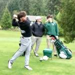 Photo by Dave Logan/ Sequims Adrian Aragon tees off by Port Angeles Max Gagnon and Sky Gelder at the seventh tee at Peninsula Golf Club on April 28 in the Duke Streeter Invitational.