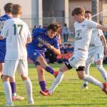 Photo by Emily Matthiessen/ Sequim senior Nico Musso (10) drives the ball forward against Port Angeles players on Friday in Sequim. The Roughriders won a defensive battle 2-0.