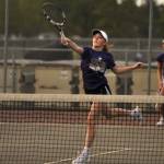 Sequim Gazette photo by Matthew Nash/ Finley Rapelje, with doubles teammate Brooke Tennell behind her, returns a hit on May 1 against North Kitsaps No. 4 doubles team Meara Byers and Bianca Palafox. Rapelje and Tennell won 6-3, 6-4.