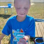 Adelaide J. enjoys bubbles during Mess Express week.