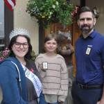 Sequim Gazette photo by Matthew Nash/
Iris Carlquist-Bundy, center, won the Sequim Irrigation Festivals button design contest this year. She received a free lunch with friends courtesy Jerrin Fiorini, new owner of RE/MAX Prime, at the Oak Table Cafe. The design contest was coordinated by Emma Rhodes, an Irrigation Festival princess and the button and pin director.