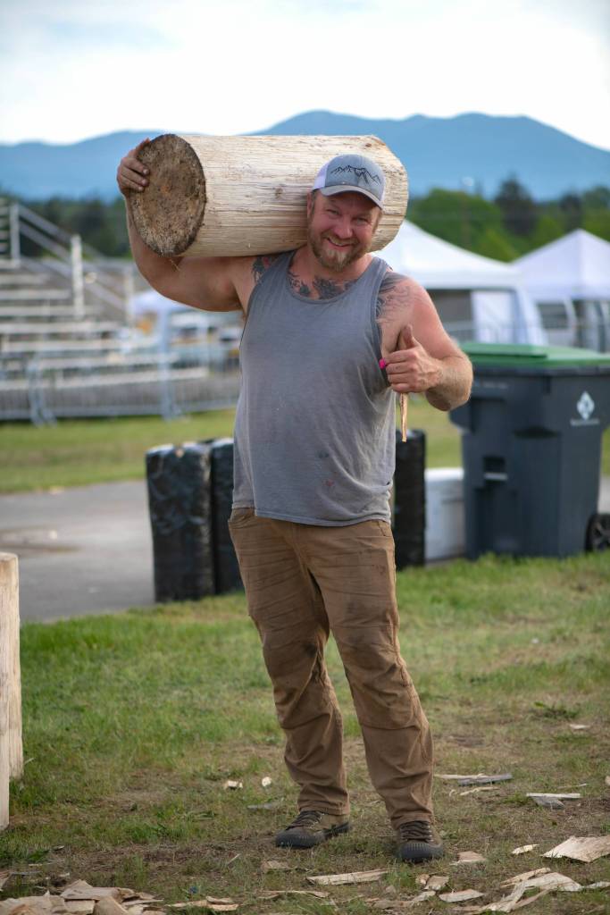 Sequim Gazette photo by Monica Berkseth/ Josh Bitzer of Chimacum won second place in Underhand Chop and won the 140cc Chainsaw Race at the Sequim Logging Show.