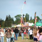 Sequim Gazette photo by Monica Berkseth/ The Sequim Logging Show was packed with people in the Blake lot south of Carrie Blake Community Park with food, games, truck and tractor pulls, a logging show, fireworks and more.