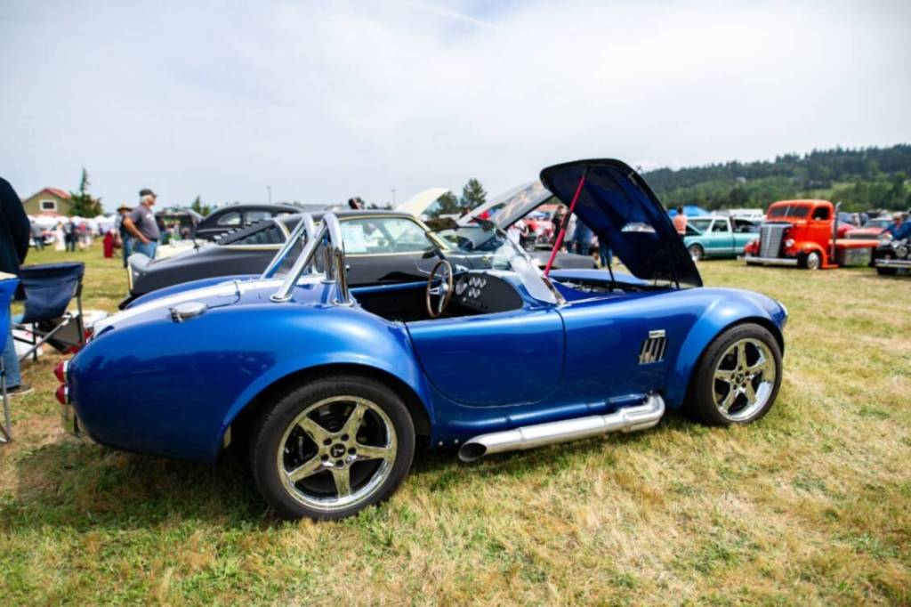 Sequim Gazette photo by Monica Berkseth/ Ralph Shelleys Factory 5 Cobra was one of about 200 vehicles at the Sequim Irrigation Festivals Classic Car Show. Shelley said hes lived in Sequim for a year and his car has been an absolute blast to drive.