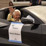 Sequim Gazette photos by Matthew Nash 
Honored Pioneer Merle Holden waves to audience members of the Grand Parade. He was one of four pioneers honored this year, including Beverly McInnes, Lou Pinnell, and Lyle Brown.