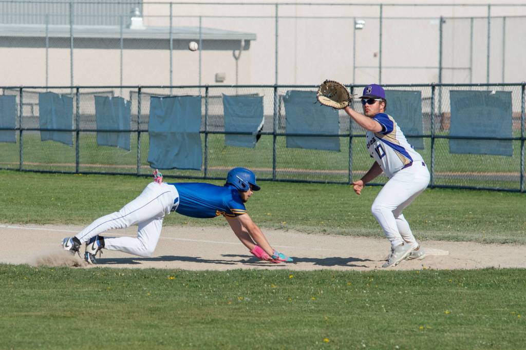 Photo by Emily Matthiessen 
Sequims Clay Abrams (10) readies to make a tag on a Bremerton baserunner on May 5 in Sequim. The Wolves won their opening game of the district tournament on May 11.