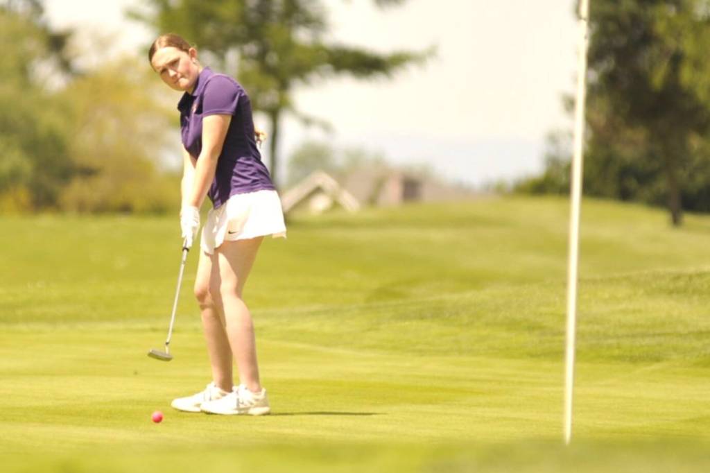Sequim Gazette photo by Matthew Nash/ Gabriella Ella Hood of Sequim putts on the front nine during the Class 2A West Central District Championship on Tuesday, May 12 at The Cedars at Dungeness Golf Course. Hood earned the district girls competitions fifth and final state berth in Chehalis on May 19-20.