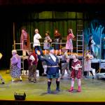Photo courtesy Mark Klinke/ The full company of Olympic Theatre Arts production of Urinetown the Musical practices the titular song Urinetown during a dress rehearsal.