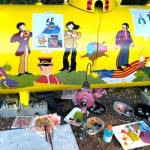 Photo courtesy Monika Livingstone 
Using a CD insert, the movie, and online screenshots, Monika Livingstone, a former mural artist, painted her homes propane tank following the Yellow Submarine animated film.