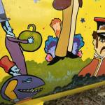 Sequim Gazette photo by Matthew Nash 
The Beatles, Sgt. Peppers Lonely Hearts Club Band, the Blue Meanies, and many other characters make appearances on Monika Livingstones Yellow Submarine mural on her propane tank.