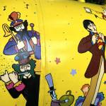 Sequim Gazette photo by Matthew Nash/ The Beatles, Sgt. Peppers Lonely Hearts Club Band, the Blue Meanies, and many other characters make appearances on Monika Livingstones Yellow Submarine mural on her propane tank.