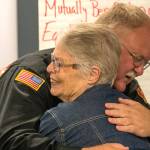 Cindy Zechenelly was honored on May 19 with a Lifetime Achievement Award through the Presidents Volunteer Service Award program managed by Points of Light. Shes served more than 4,000 hours as a co-founder of Sequims Community Emergency Response Teams (CERT), sponsored by Clallam County Fire District 3. Here Zechenelly hugs Fire Chief Justin Grider.