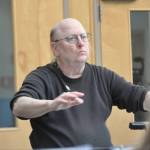 Sequim Gazette photo by Matthew Nash/ Steven Humphrey conducts a rehearsal of the Peninsula Singers prior to to their spring concert Unbound.