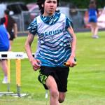 Photo by Liv Thompson/ Leo Rivas runs his leg of the 4x100 meter relay. He ran with Tomas Gonzalez, Jack Jacobs, and Owen DeAngelo to take fifth place (59.08).