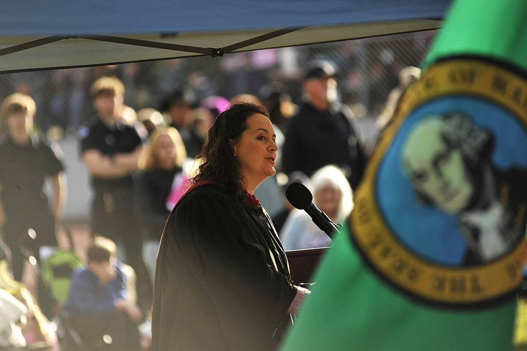 Staff speaker Jill Brouillard encourages graduates to show up and be present in day-to-day life and to embrace hard work and challenges.
