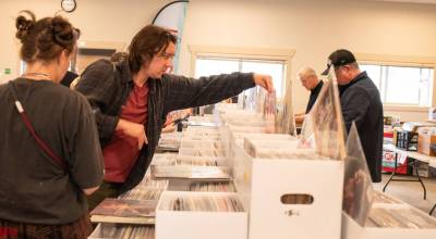 Sequim Gazette photo by Monica Berkseth/ Miranda Knight-Miles, left, and Andy Jauhola, both of Port Townsend, were among those who perused records at Saturdays fourth annual Sequim Record Show.