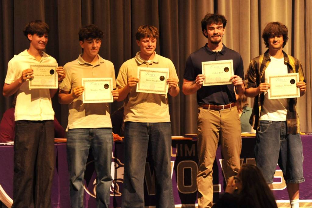Sequim Gazette photo by Matthew Nash/ Sequim Soccer Booster Club Scholarship awarded five scholarships to, from left, Sebastian Buhrer, Nico Musso, Finn Braaten, Colin Feik, and Josh Alcaraz.
