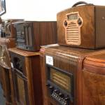 Sequim Gazette photo by Matthew Nash/ Classic radios line the walls of KSQM 91.5 FMs meeting space.