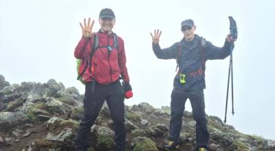 Photo courtesy The Monday Ramblers
Pete Alexander, left, and Steve See, both of Sequim, display fours after hiking Mount Townsend four days in a row from four different trailheads. The Monday Ramblers hiking group, of which they are members, created the challenge that they call the Mount Townsend Grand Slam. It features 35 total miles of hiking and an 11,680 feet elevation gain.