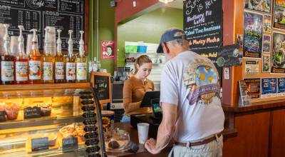 Photo by Emily Matthiessen 
Lauren Nightengale helps Phil Mesibove at Rainshadow Cafe. The coffee shop and eatery received a perfect score on its health inspection in June.