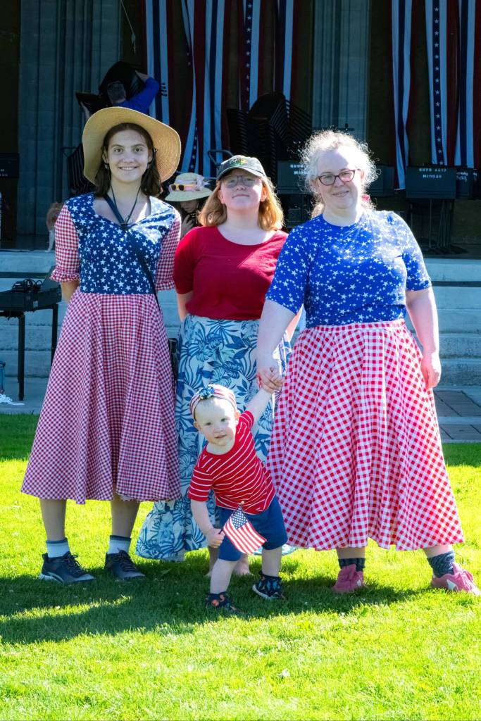 Sequim Gazette photo by Monica Berkseth/ The Fetterman family wears patriotic attire for the Party in the Park on July 4 with their family coming nearly every Independence Day for music, they said.