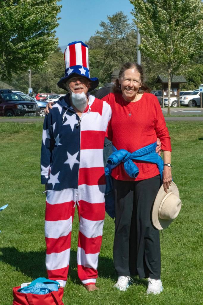 Sequim Gazette photo by Monica Berkseth/ Steve and Erica Lawry dress up for the Party in the Park with the couple saying they come every year for the Sequim City Bands annual concert on July 4.