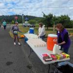 Photo by Beth Pratt/ On Sunday, June 7, Sequim-Dungeness Valley Chamber of Commerce board members and staff worked a water station for marathon runners who participated in the North Olympic Discovery Marathon.