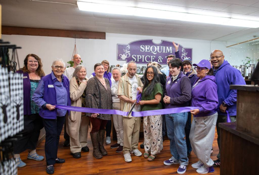 Photo by Time Catcher Photography 
A ribbon cutting was held on Friday, June 5 during the grand opening of Sequim Spice & Tea, now owned by Jason and Lymari Dye. The celebration coincided with Sequims First Friday Art Walk.