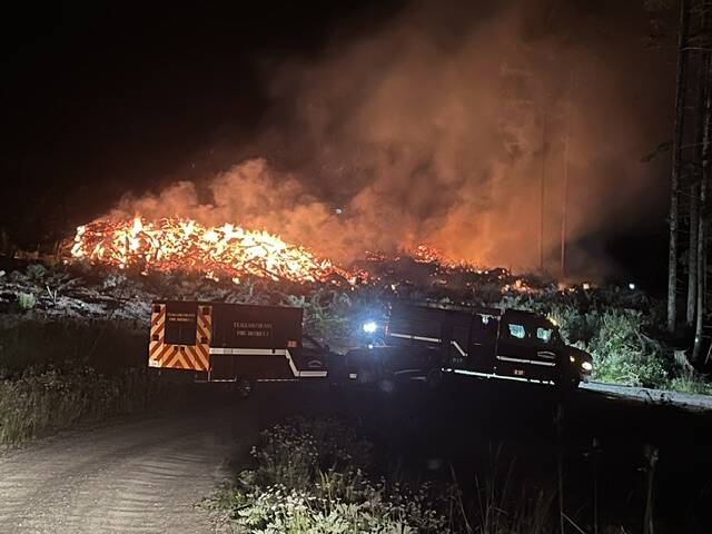 Photo courtesy of Chris Turner, FD3/ Firefighters with Clallam County Fire District 3 and the Department of Natural Resources contained a fire south of Blyn late on July 7. Its cause remains under investigation.