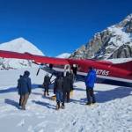 Photo courtesy Paul Balkan/ A Talkeetna Air Taxi prepares to take the weary climbers to Talkeetna after their successful climb.