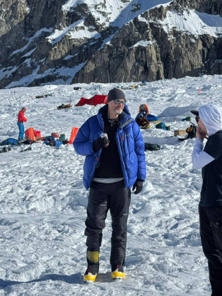 Photo courtesy Paul Balkan
Balkan chats with a fellow climber at the base of Kahiltna Glacier as they wait for a plane to take them back to Talkeetna after scaling Denali. Balkan scrambled up peaks in the Olympics while growing up in Sequim, then moved on to the Cascades with a goal of someday climbing the challenging mountain.
