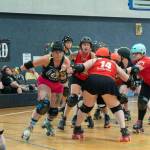 Jaden Friedel, jammer for roller derby home team the Port Scandalous Scandals, breaks free from a block by visiting team the Walla Walla Sweets during last Saturdays game at the Sequim Boys & Girls Club. Walla Walla won with a final score of 175-115.