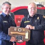 Photo courtesy Clallam County Fire District 3 
Leonard Horst is honored with a retirement plaque on July 1 in Clallam County Fire District 3s Station 34 by Fire Chief Justin Grider. Horst started as a volunteer firefighter/EMT in May 1997, was hired in July 2001, and officially retired on June 30, 2026.
