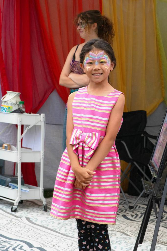 Sequim Gazette photo by Monica Berkseth/ Evelyn Shattuck, 8, from Renton smiles after having her face painted on July 17. She and her family come every year for the Sequim Lavender Festival, her family said.