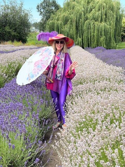 Photo courtesy Kathryn Wilson/
Kathryn Wilson, who has lived in Sequim since 2013 after working and traveling all around the world for 40 years, said she loves the Sequim Lavender Festival and makes an annual effort to dress up in lavender colors to join the celebration.