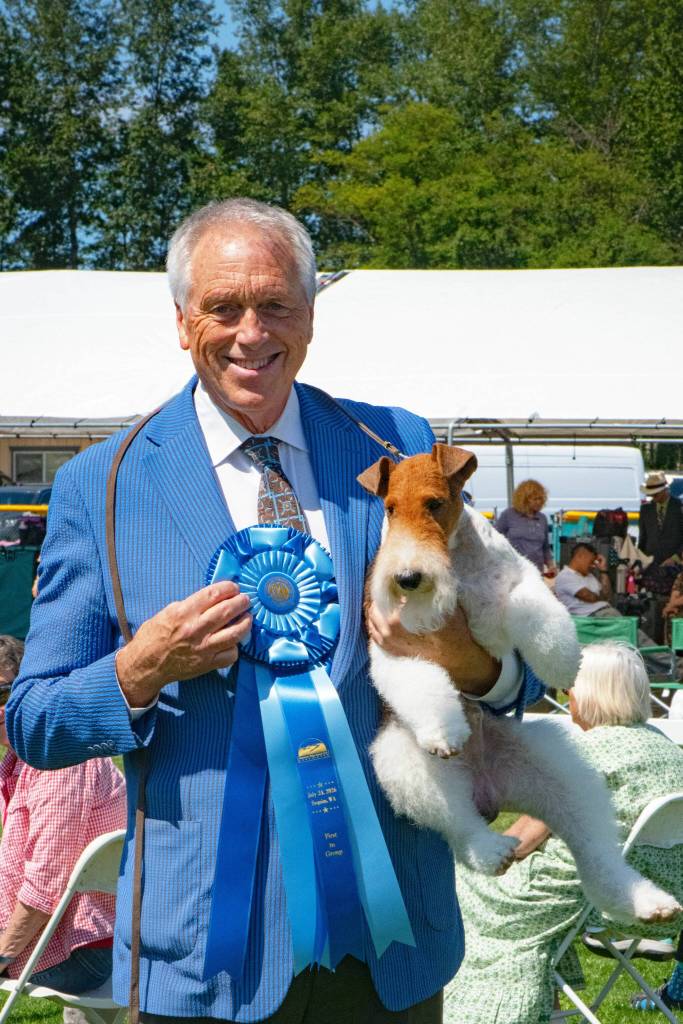 Bill McFadden and his dog Shoe won first in the Terrier competition of the Hurricane Ridge Kennel Clubs All Breed Dog Show.