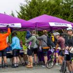 Sequim Gazette photo by Tom Buscher/ Tour de Lavender participants queue up to the check-in table under cloudy skies Saturday morning, Aug. 1.