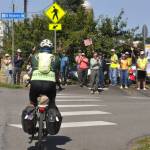 Sequim Gazette photo by Matthew Nash/ Locals greet US Army veteran Patrick Smith on Monday, Aug. 3, at the Sequim Visitor Information Center. Smith rode his bike from Washington, D.C. as part of the Warrior Bike program that offers support through the expedition for veterans. He finished his journey on Aug. 4 in La Push. Some of the supporting groups on hand included the Peninsula Trails Coalition, Military Officers Association of America Olympic Peninsula Chapter, Daughters of the American Revolution New Dungeness Chapter, Sequim-Dungeness Valley Chamber of Commerce, and the Sequim Wheelers.