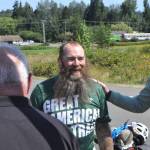 Sequim Gazette photo by Matthew Nash/ Patrick Smith of Florida greets local supporters of his Warrior Bike ride on Aug. 3. Hes gone along the Great American Rail-Trail starting in Washington, D.C. and was set to finish on Aug. 4 in La Push.